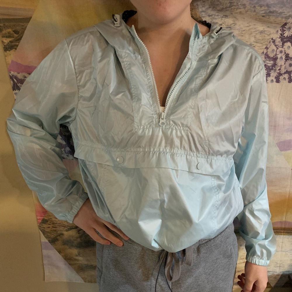 Baby blue coloured windbreaker jacket